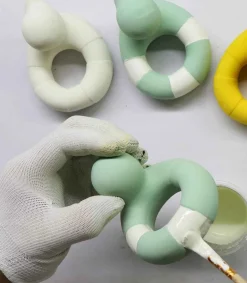 Oli & Carol Flo the floatie mint Bad und Beißspielzeug
